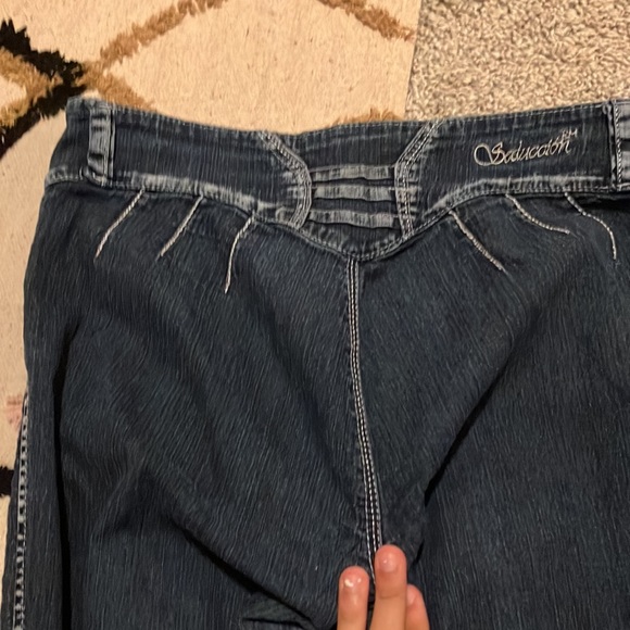 Two pairs of jeans.Both are brand new with no tags.Have cool designs aswell. - Picture 8 of 8